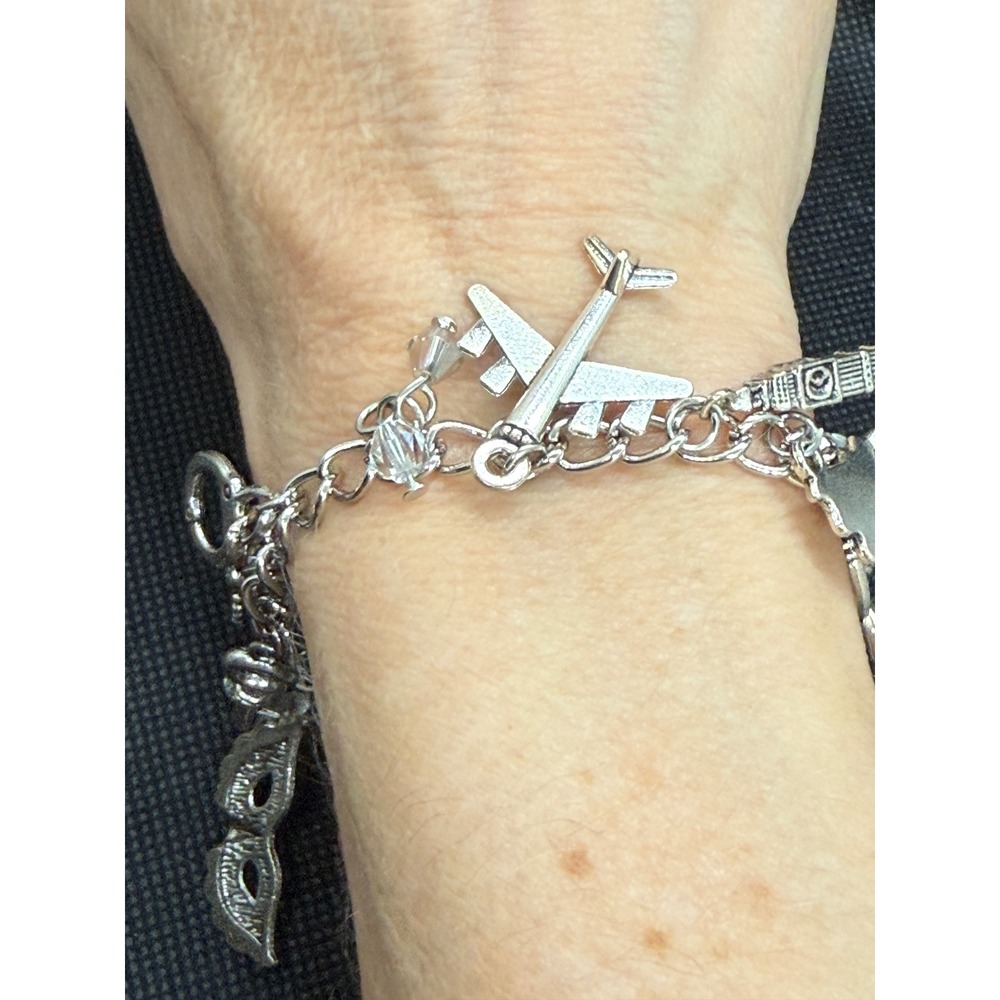 Silver Tone Travel Theme Charm Bracelet Airplane Eiffel Tower Big Ben Toggle 8in